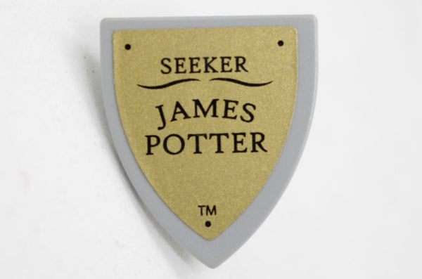 Kilpi, kolmio, "Seeker James Potter", tarra