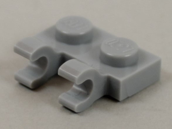 Kiinnike Litteä 1x2 Sivulla